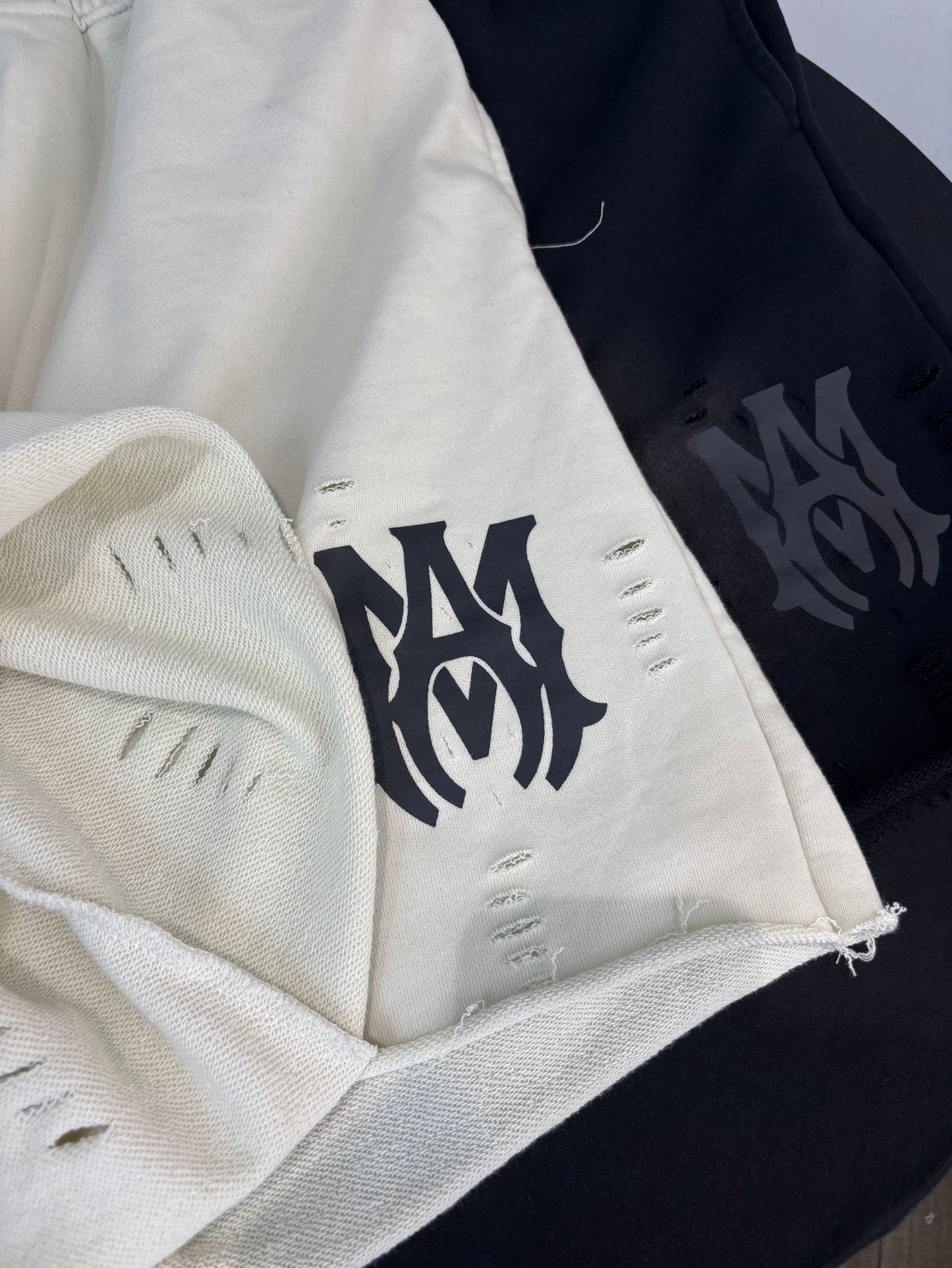 AMIRI Distressed Cloud Terry Shorts — White Edition